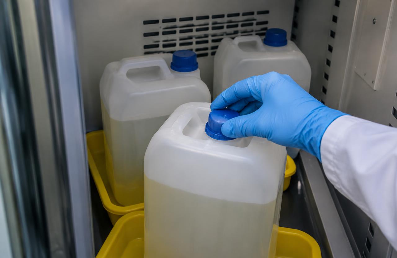 Isopropyl alcohol bottles and wipes ready for disposal